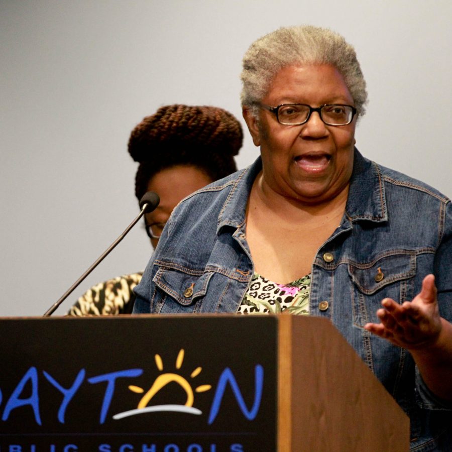 Representing Racial Justice Now, Vernellia Randall, foreground, and Maria Holt (partially hidden in background) took turns speaking to the Dayton Public School Board in a recent meeting. JIM WITMER / STAFF